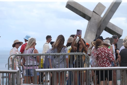 salvador, bahia, brazil - january 2, 2023: Tourists visit the Cruz Caida monument in Praça da Se, historic center of Salvador.