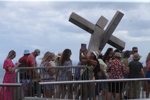 salvador, bahia, brazil - january 2, 2023: Tourists visit the Cruz Caida monument in Praça da Se, historic center of Salvador.