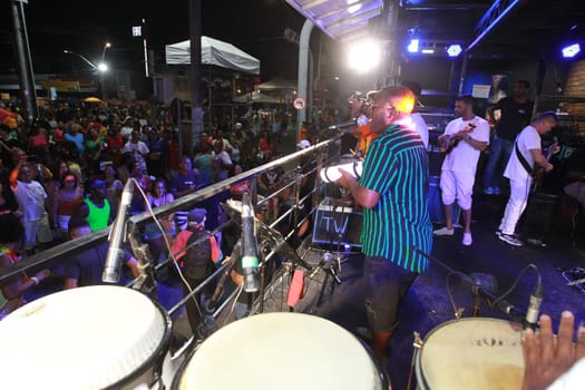 salvador, bahia, brazil - april 23, 2023: precursion band during micareta in the city of Feira de Santana.