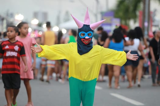 salvador, bahia, brazil - april 23, 2023: child wears costume during micareta in the city of Feira de Santana.