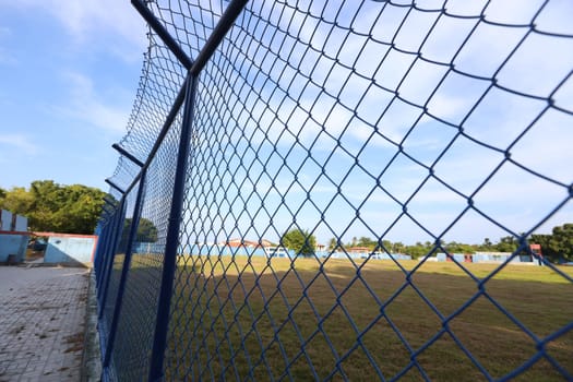 salvador, bahia, brazil - january 7, 2025: view of a wire mesh on a football field in the city of Salvador.