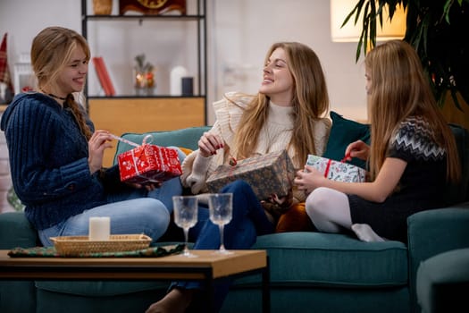 A joyful gathering of friends sharing heartfelt gifts and contagious laughter on a cozy and inviting couch