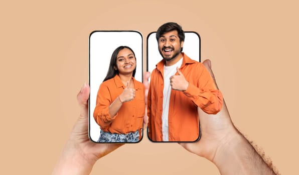 A happy couple shares an affectionate moment as they connect online by chatting on their smartphones. Their expressions showcase love and togetherness, highlighting modern relationships.