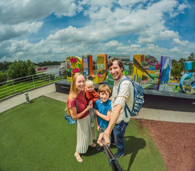 30.07.2024 Puebla, Mexico: Family of tourists in front of the panoramic view of Puebla city, Mexico. Travel, cultural exploration, and scenic landscape concept.