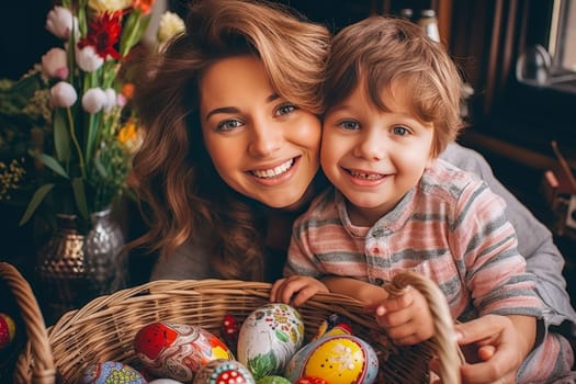 A joyful mother and her young son pose with a basket of painted Easter eggs, surrounded by fresh flowers, ideal for Easter celebrations