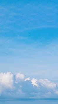 VERTICAL Atmosphere panorama real photo beautiful summer white cloud clear blue sky line calm. Concept paradise life. Design relax wallpaper background. More tone format in stock, fantasy collection.