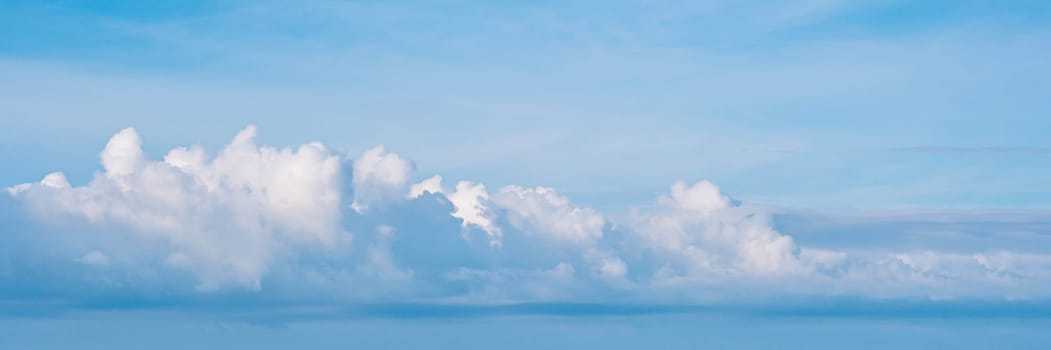 BANNER Atmosphere long panorama real photo beautiful summer white cloud clear blue sky line calm. Concept paradise life. Design relax wallpaper background More tone format fantasy collection in stock