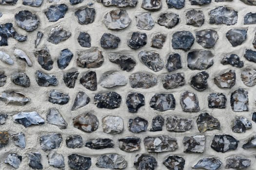 Flint stone wall. Building in Normandy France Alabaster Coast