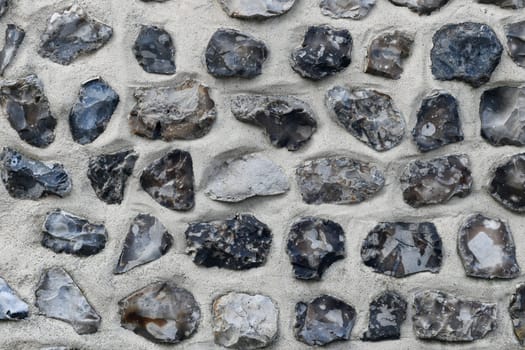 Flint stone wall. Building in Normandy France Alabaster Coast