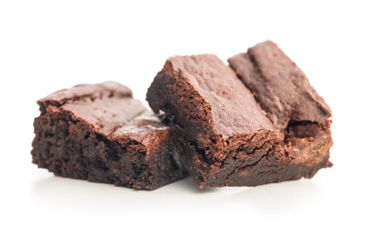 Homemade chocolate brownies isolated on a white background.