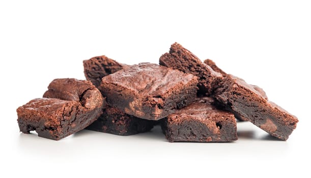 Homemade chocolate brownies isolated on a white background.