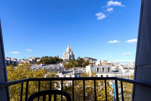 View to the streets of Montmartre and roofs of buildings in Paris, France. Paris, France - October 25, 2024