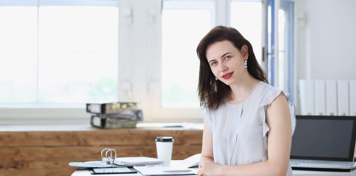 Beautiful smiling businesswoman portrait at workplace look in camera. White collar worker at workspace exchange market job offer certified public accountant internal revenue officer concept