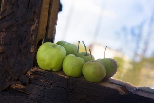 Reflection of apples in a mirror Concept of the autumn