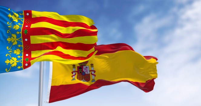 Flags of Valencian Community, Spain and the European Union waving on a clear day. Autonomous community of Spain. 3d illustration render. Selective focus. Close-up. Fluttering fabric