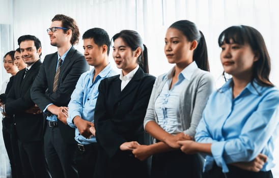 Modern diversity and multicultural company, business people joining hand together and standing in line, shared commitment to collaboration and cooperation concept background. Meticulous