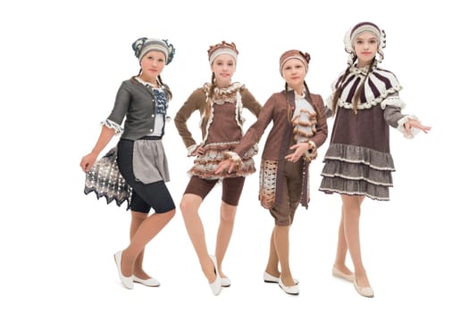 Group of pretty girls wearing fashion costumes and hats isolated view