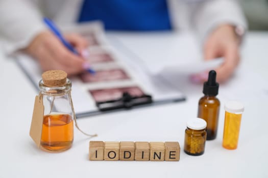This study analyzes iodine solutions, highlighting a lab setup with various containers and materials
