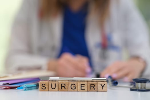 Image showing the preparation for surgery which includes various tools and a dedicated medical professional