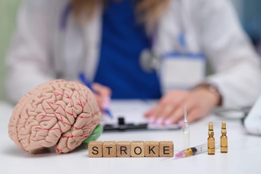 An insightful representation of stroke awareness showcasing a detailed brain model along with essential medical tools
