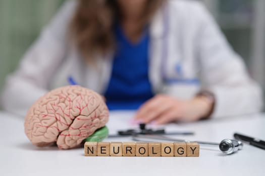 Explore neurology with this detailed brain model, essential tools, and educational elements in a medical setting