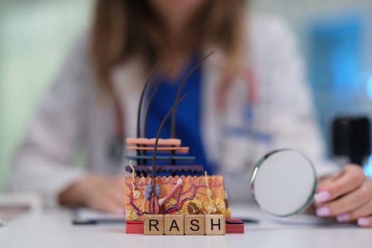 A comprehensive medical model of a skin rash, examined with specialized tools by a trained professional