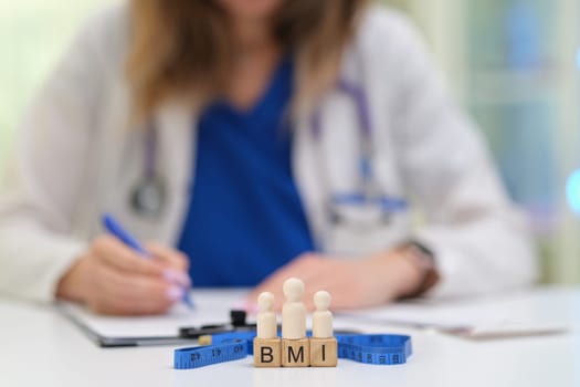 A medical professional examines BMI, highlighting effective health assessment tools used in practice