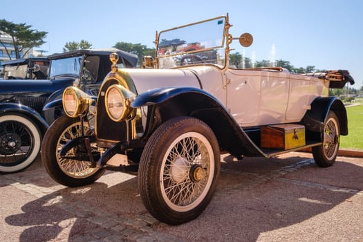 Lisbon, Portugal - Sep 29, 2024: Rare vintage white car Diatto Tipo 20s with vaulted grille on sunny day. Unique car design, quality vehicle, 1920s race cars, Diatto, Turin, Italy