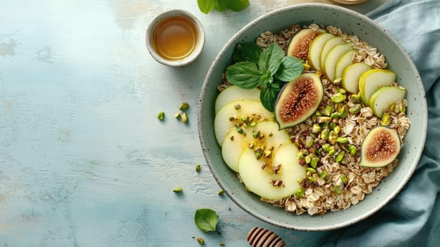 A vibrant breakfast bowl features creamy oats topped with slices of green apple, figs, and crushed pistachios, garnished with mint leaves and honey.