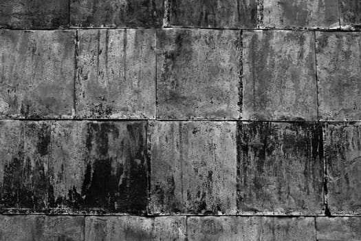 Background of an old sheet metal wall in black and white