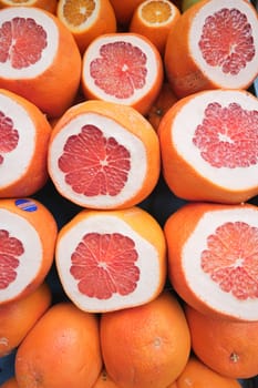 Fresh grapefruits display for sale .