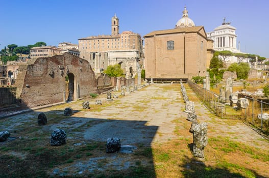 Basilica Emilia in the Roman forum with the Curia in the background, Rome