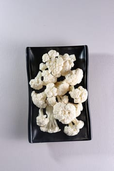 white delicious and fresh cauliflower.Garnish. View from above. Chinese cuisine, hotpot ingredient