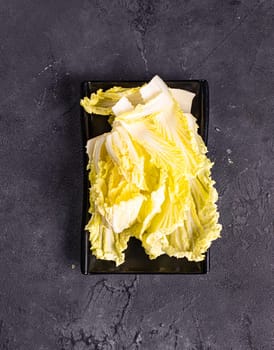 yellow and fresh chinese cabbage. Garnish. View from above. Chinese cuisine, hotpot ingredient