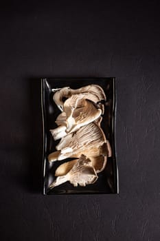 fresh and healthy oyster mushrooms. View from above. Chinese cuisine, ingredient for hotpot