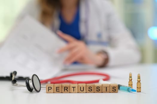 A medical professional thoroughly examines the signs of pertussis using a stethoscope along with vaccine representation