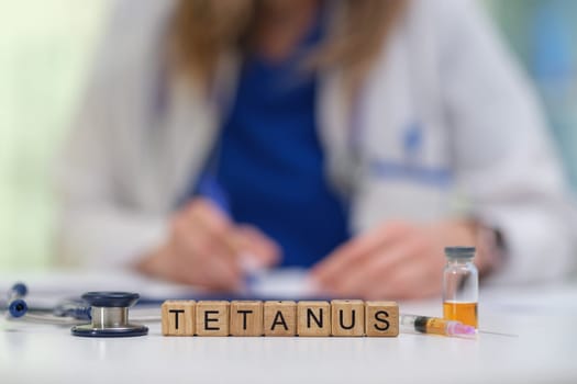 A qualified medical professional thoroughly explains the Tetanus vaccination process with related materials