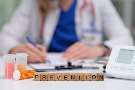 A healthcare professional stresses prevention with various medical tools, highlighting the word PREVENTION