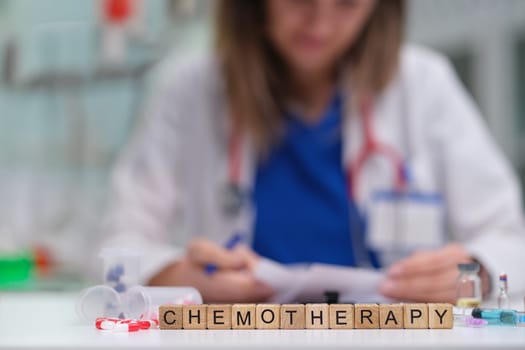 A dedicated healthcare professional is reviewing essential chemotherapy information at a medical facility