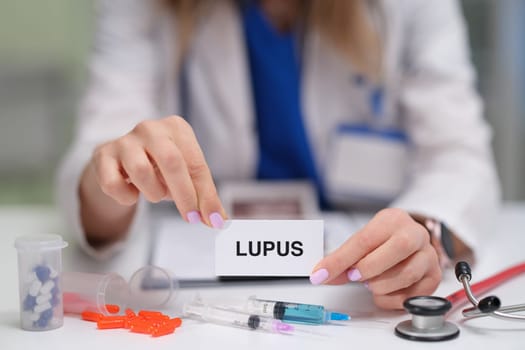 A medical professional discusses lupus, highlighting essential tools and materials relevant to the condition