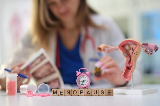 A knowledgeable healthcare professional explores menopause complexities using various informative models and resources