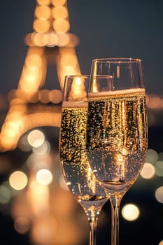 glasses of champagne on the background of the Eiffel Tower. Selective focus.