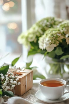 cup of tea gift and flowers. Selective focus.