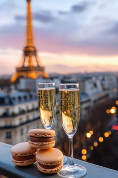 Close-up of champagne and macaroons on the background of the Eiffel Tower. Selective focus.