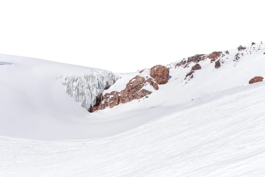 Panorama of winter mountains covered in snow isolated on white background. Mountain peaks in winter