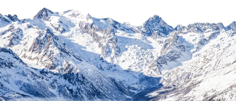Panorama of winter mountains covered in snow isolated on white background. Mountain peaks in winter