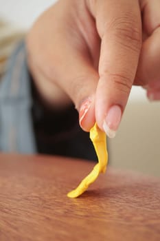 effectively removing chewing gum, with closeup view focus.