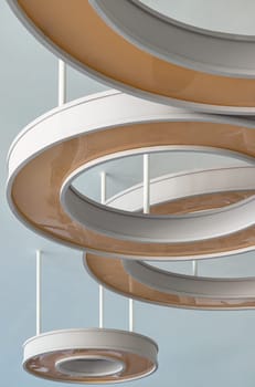 Bangkok, Thailand - Jan 18, 2025 - Architecture and interior design round lights on ceiling. The Rounded ceiling mounted light fixtures with modern LED light bulb, The circular ring shaped lamps hang under ceiling, use it as your Wallpaper, Poster and Copy space, Selective focus.