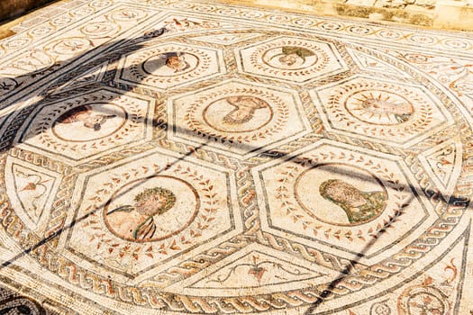 Mosaic of the House of the Planetarium, with the representation of the gods that give name to the days of the week, in the Roman city of Italica