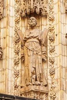 Statue of the apostle Saint Andrew on the Assumption Gate of the Cathedral of Seville